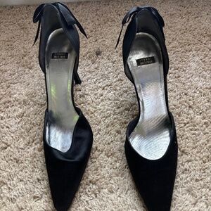 Lightly used Size 10 Stuart Weitzman Bow Black 3 inch satin heels